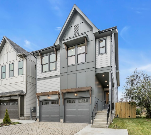 multi unit property featuring a garage