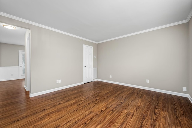 unfurnished room with crown molding and dark wood-type flooring