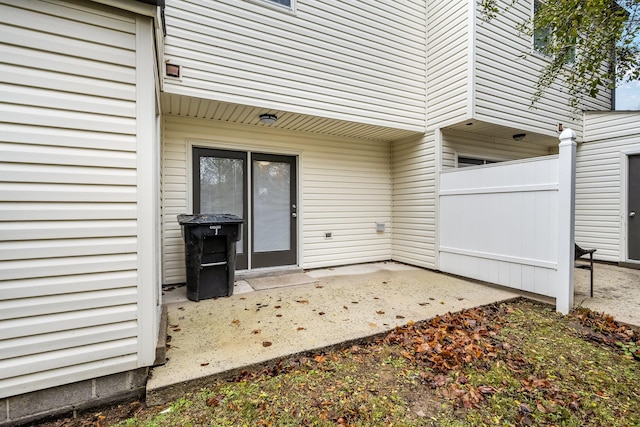 entrance to property featuring a patio area