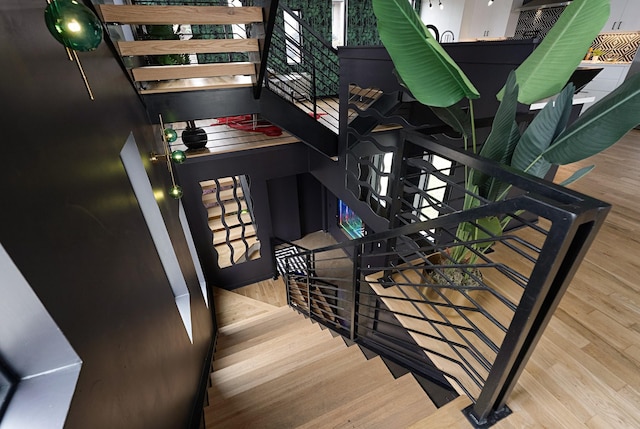 staircase featuring hardwood / wood-style flooring