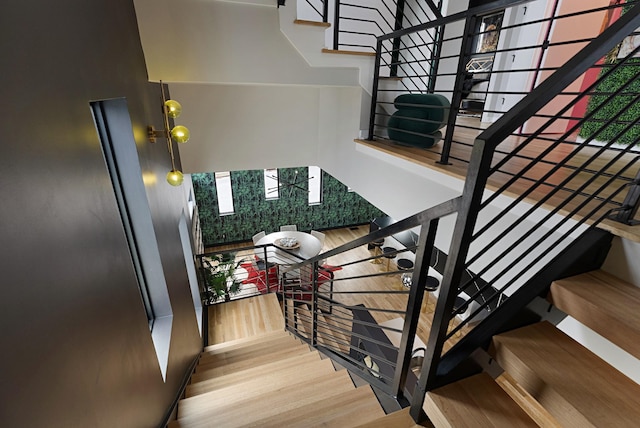 stairway with wood-type flooring