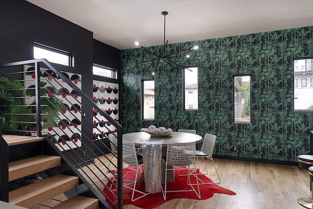 dining room with hardwood / wood-style floors and a wealth of natural light