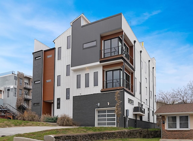 view of building exterior featuring a garage