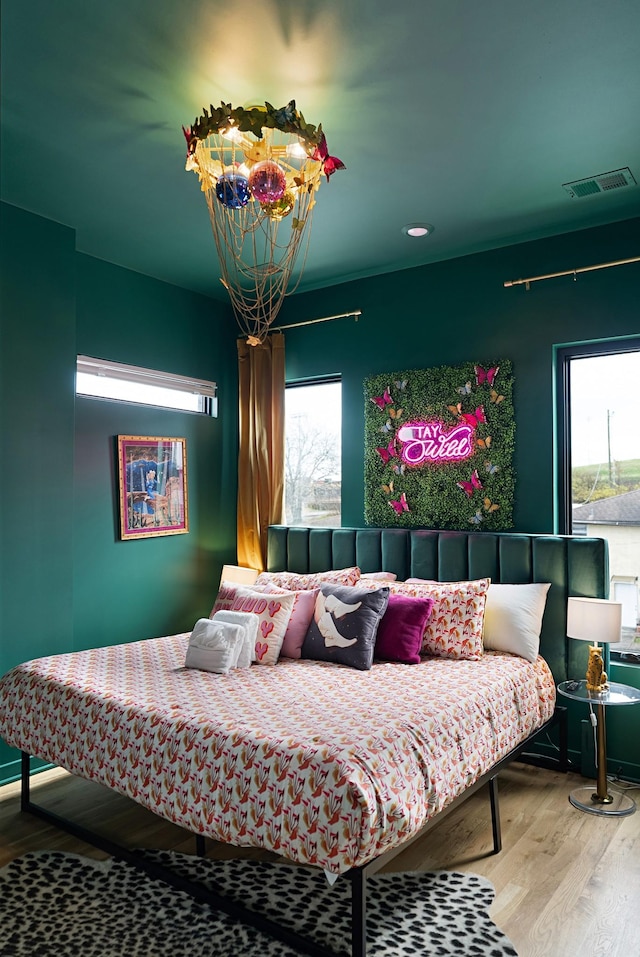 bedroom featuring hardwood / wood-style floors