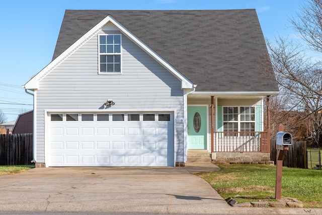 view of front facade with a front lawn, a porch, and a garage