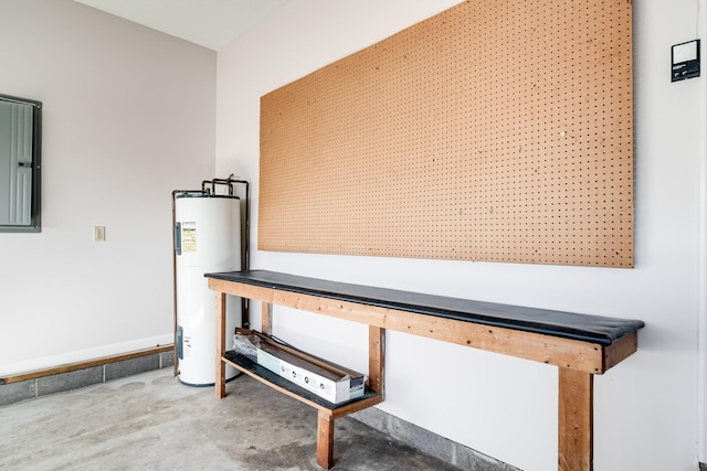 interior space featuring water heater and concrete flooring