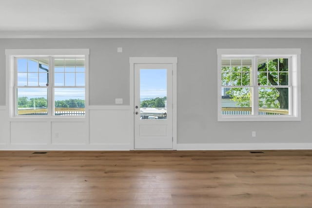 4217 Oakland Ave Lot 194, Chattanooga, TN 37410 - entryway with visible vents, ornamental molding, wood finished floors, and a wainscoted wall