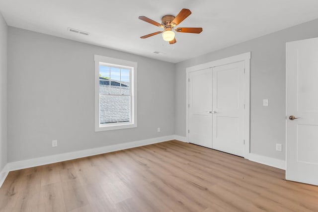 4217 Oakland Ave Lot 194, Chattanooga, TN 37410 - unfurnished bedroom featuring visible vents, baseboards, a closet, and light wood-type flooring