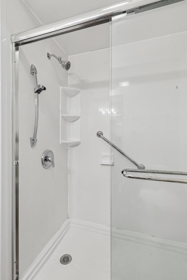 bathroom with an enclosed shower