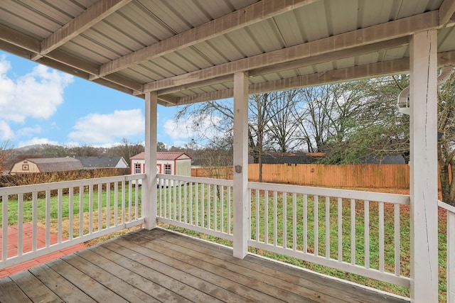 wooden terrace with an outdoor structure