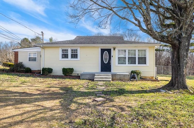 ranch-style home with a front yard