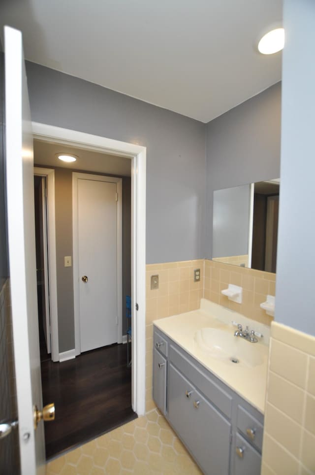 bathroom featuring hardwood / wood-style floors and vanity