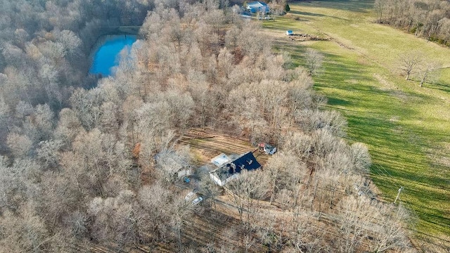 drone / aerial view featuring a rural view and a water view