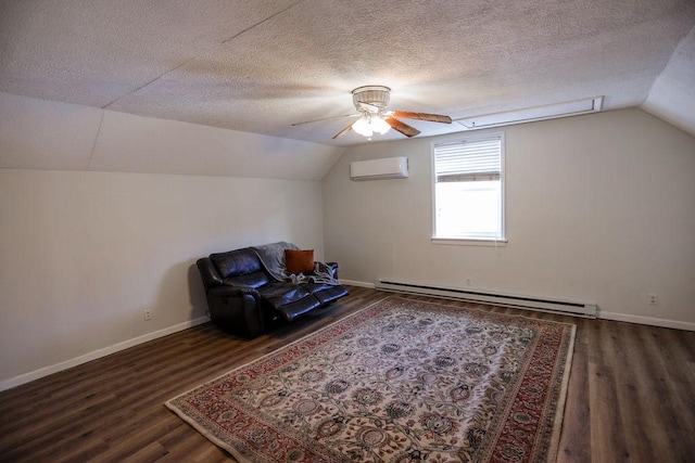 unfurnished room featuring a textured ceiling, a baseboard radiator, vaulted ceiling, an AC wall unit, and dark wood finished floors