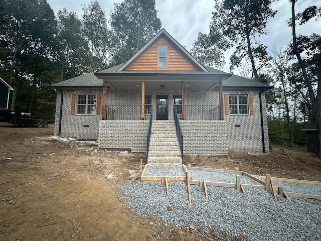 view of front of property featuring covered porch