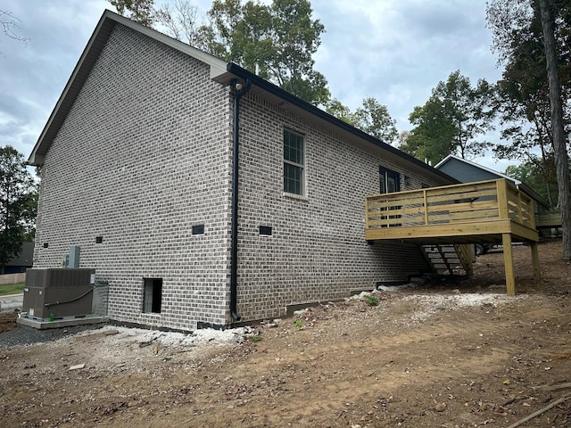 view of home's exterior featuring a deck