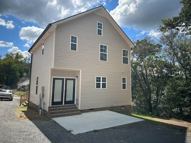 back of house featuring a patio