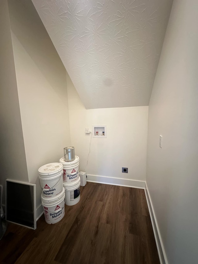 laundry area featuring hookup for an electric dryer, hookup for a washing machine, and dark hardwood / wood-style floors