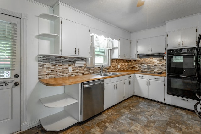 kitchen featuring decorative backsplash, a textured ceiling, sink, black appliances, and white cabinetry