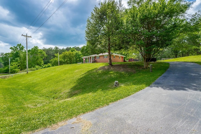 view of front of home with a front lawn