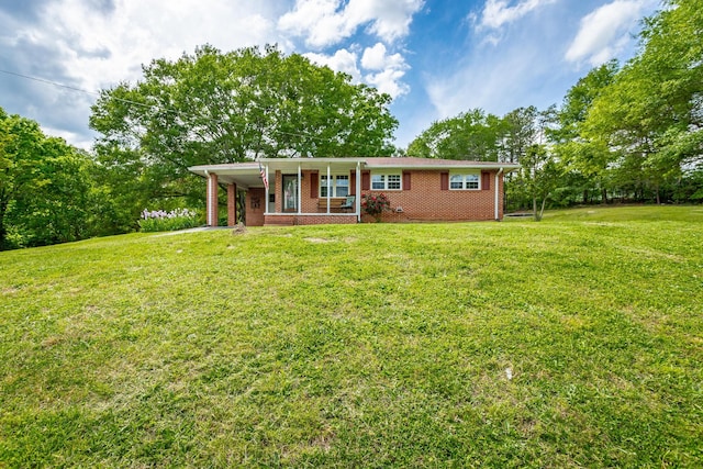 ranch-style house featuring a front lawn and a porch