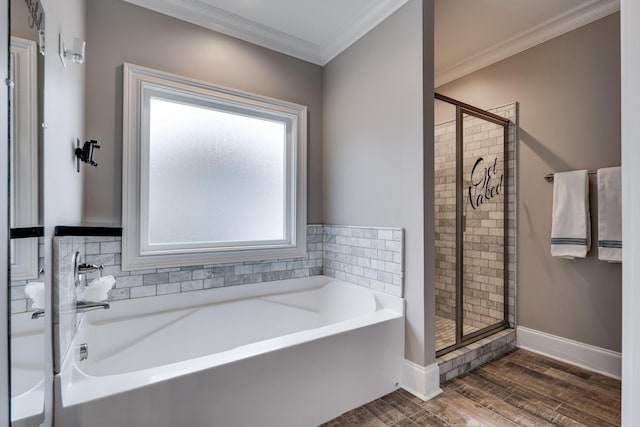 bathroom featuring hardwood / wood-style flooring, independent shower and bath, and crown molding