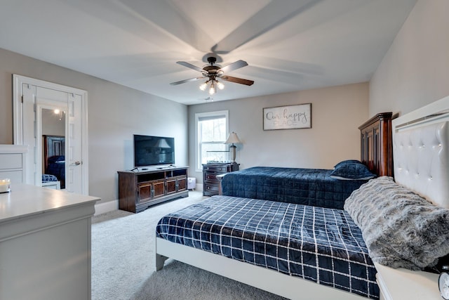 bedroom featuring ceiling fan and light colored carpet