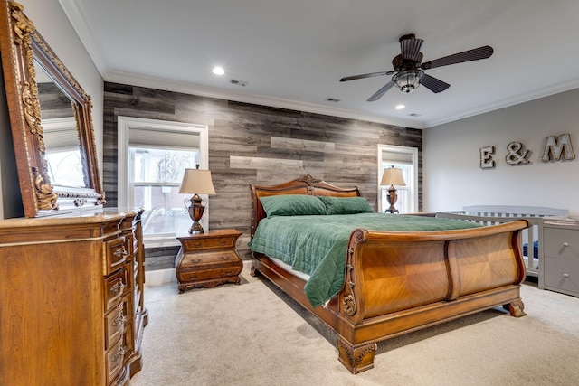 bedroom featuring carpet, ceiling fan, and crown molding