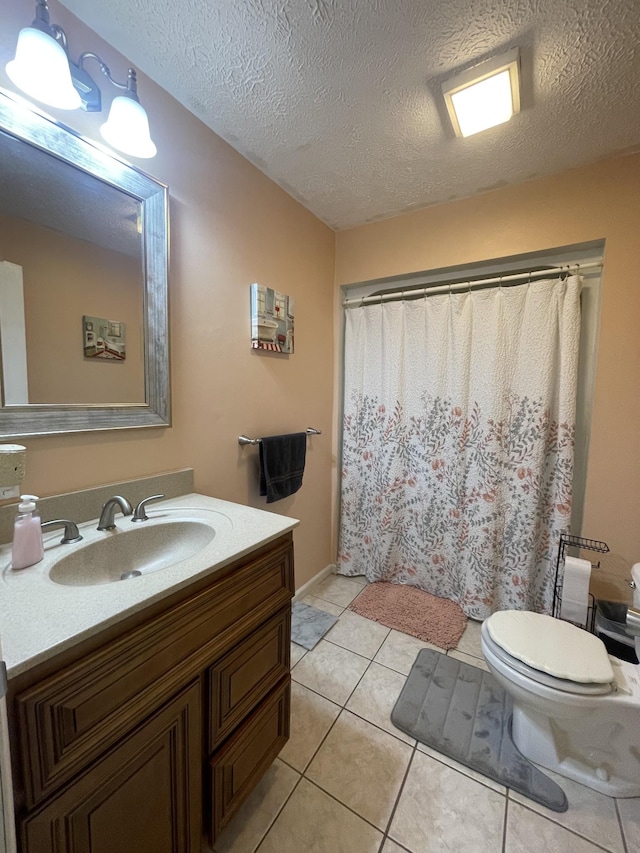 173 Twin Oaks Dr, Hohenwald, TN 38462 - bathroom with vanity, tile patterned floors, a textured ceiling, and curtained shower