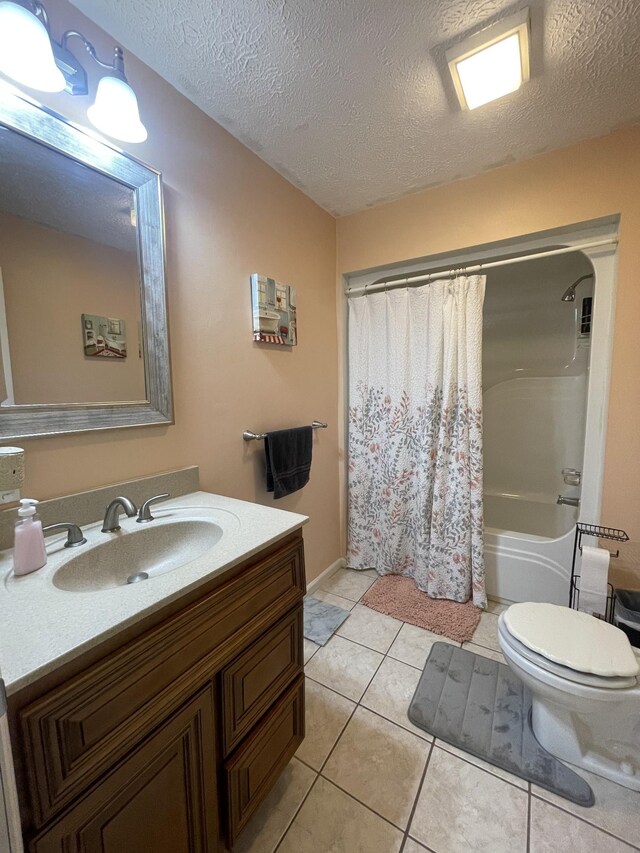 173 Twin Oaks Dr, Hohenwald, TN 38462 - full bath featuring vanity, tile patterned flooring, a textured ceiling, and shower / tub combo with curtain