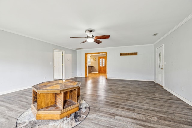 living room featuring dark hardwood / wood-style flooring, ceiling fan, and ornamental molding