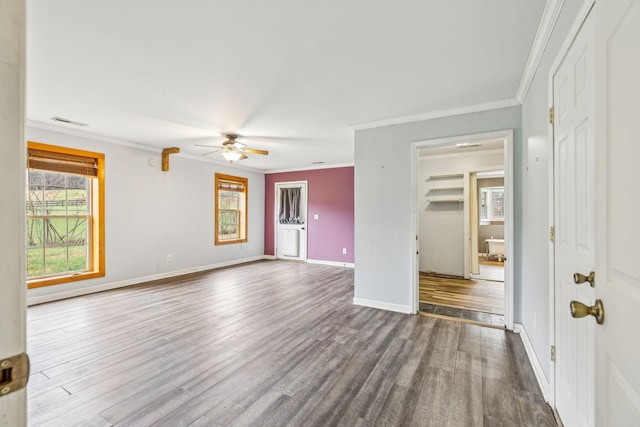 interior space featuring hardwood / wood-style floors, ceiling fan, and crown molding