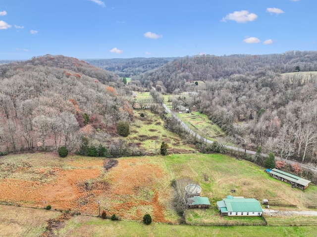 birds eye view of property featuring a rural view