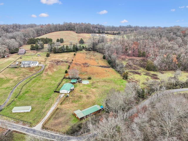 birds eye view of property featuring a rural view