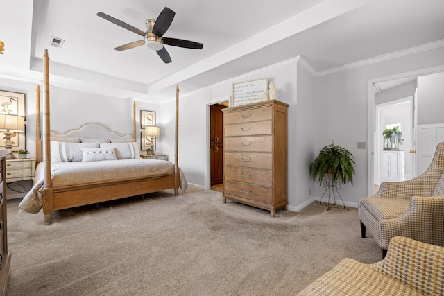 carpeted bedroom with ceiling fan and ornamental molding