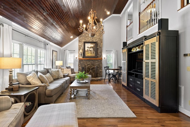 living room with hardwood / wood-style flooring, wood ceiling, and ornamental molding