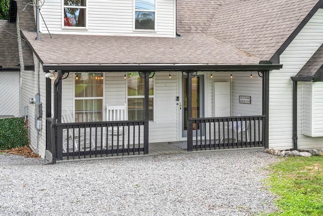 property entrance featuring covered porch