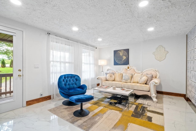 living room with a textured ceiling