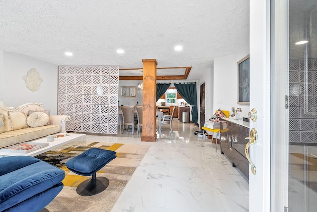 living room featuring a textured ceiling