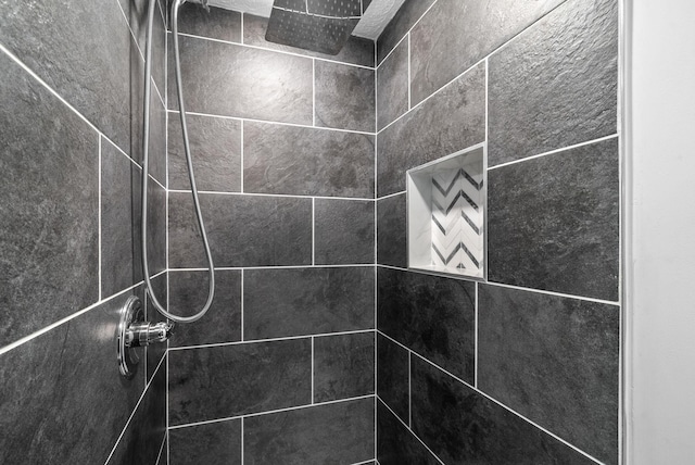 details featuring a tile shower