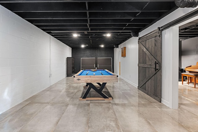 game room with a barn door and billiards