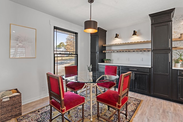 dining room featuring light hardwood / wood-style floors