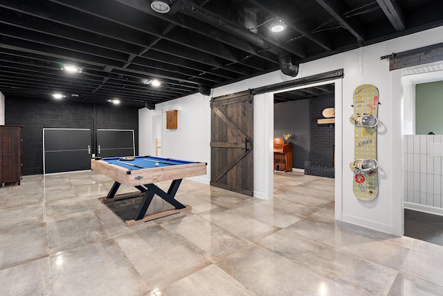 playroom featuring a barn door and billiards