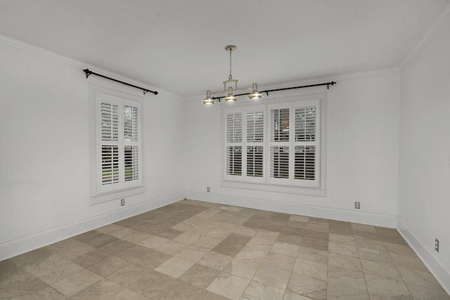 unfurnished dining area with ornamental molding and a notable chandelier