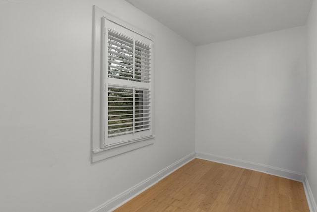 unfurnished room featuring wood-type flooring