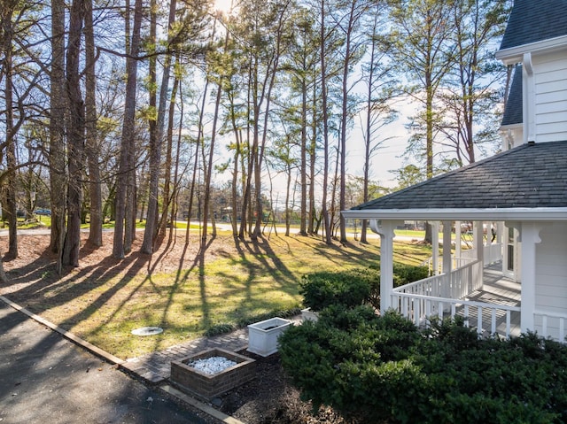 view of yard featuring a porch