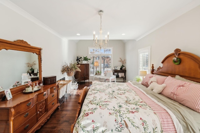 bedroom with dark hardwood / wood-style floors, an inviting chandelier, and crown molding