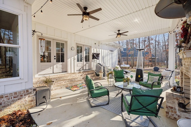 view of patio / terrace featuring french doors and ceiling fan