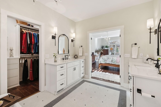 bathroom featuring vanity and wood-type flooring