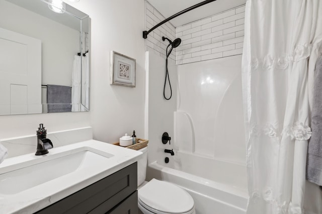 full bathroom featuring vanity, shower / bath combo, and toilet